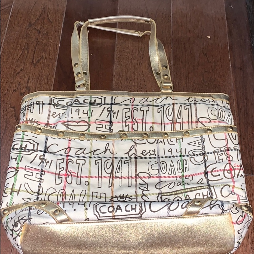 GOLD AND CREAM COACH PURSE